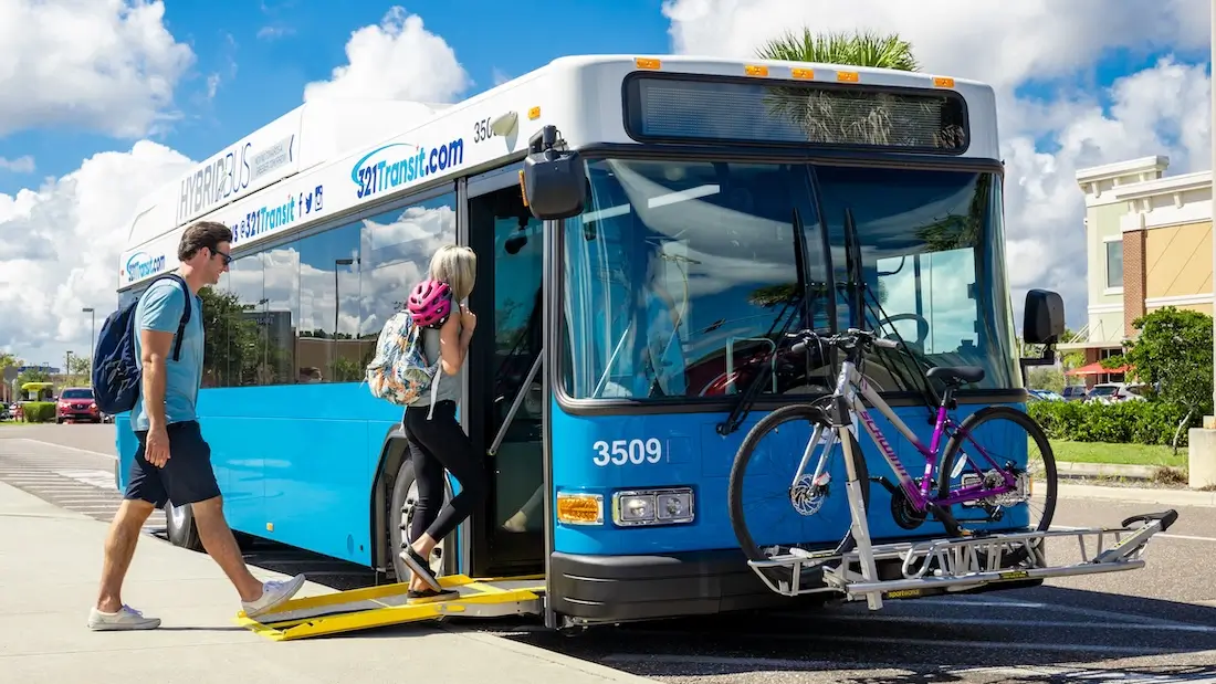 People getting on a bus