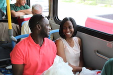 Couple riding bus